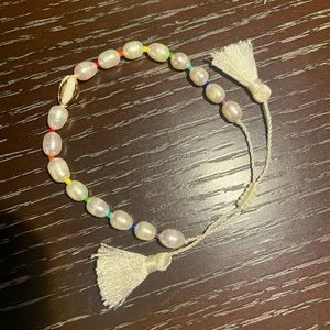 Conch shell bracelet. Sliding knot clasp with Tassels.